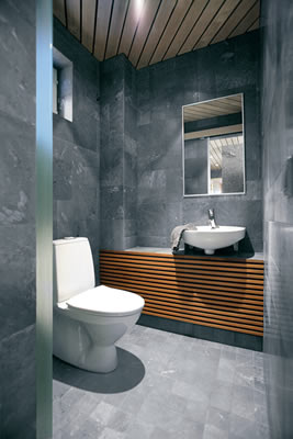 Luxury stone and ceramic tiled bathroom by Prades of Chippenham 